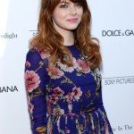 Back-to-School Haircut Ideas: Layers and side bangs akin to Emma Stone.